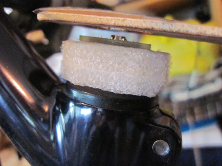Side view of steering sensor assembly showing magnet flying just above Hall sensor