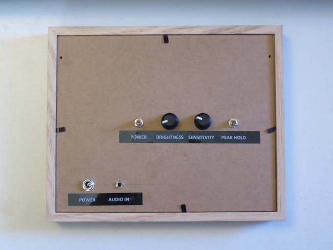 The back of the frame with 2 switches, dials and connectors.