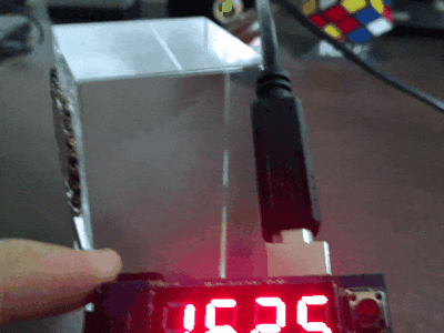 Digital Clock with Mirrored Display Driven by Accelerometers