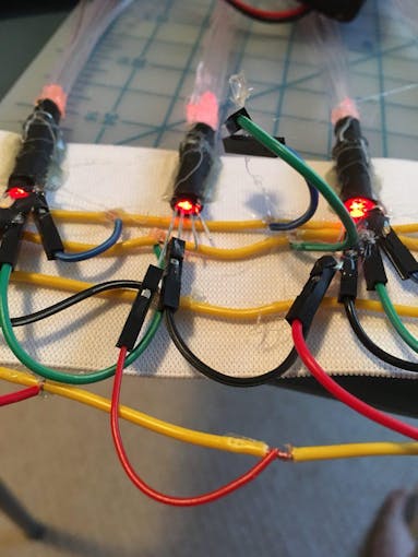 A close up view of of the wiring. The jumpers are color coded, and the yellow wires are my "rails". Jumpers allow for easy problem solving if a light isn't working.