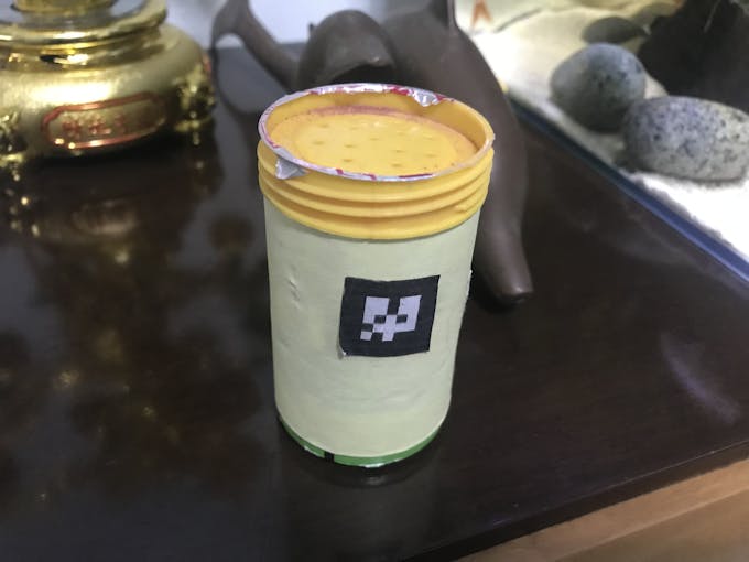 AR Tag pasted on the fish food