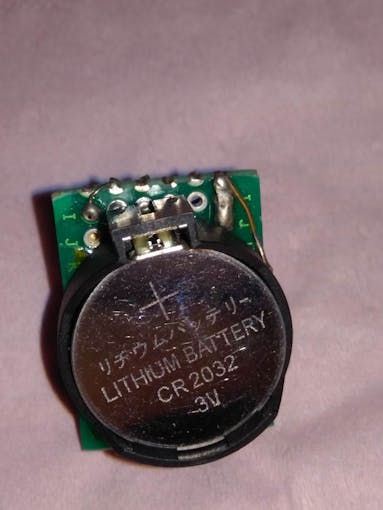 Battery placed on holder