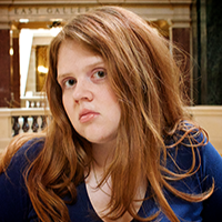 Janie “Red Queen Coder” Clayton