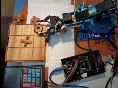 Tic-Tac-Toe Board Game with Robotic Arm