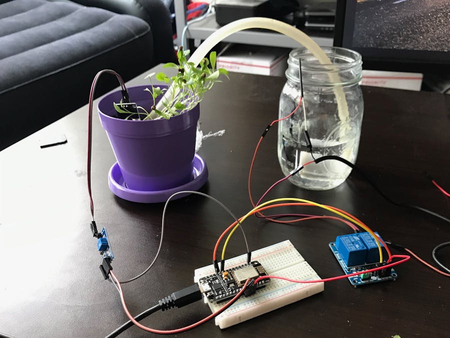 Automatic Plant Watering System with SMS confirmation