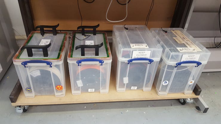 Filament Storage at Cambridge MakeSpace New lid design on the left, old style on the right