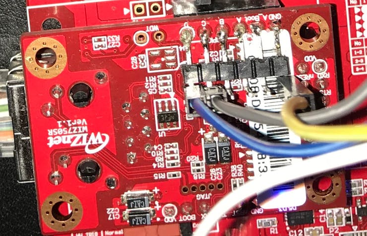 Right angle pins header soldered to WIZ750SR module