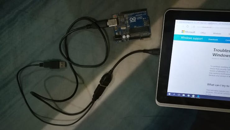 Arduino connected to tablet with USB A to B and micro USB to Otg cables