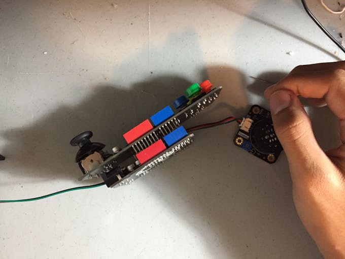 Threading the Speaker Module Cable Through the Assembly