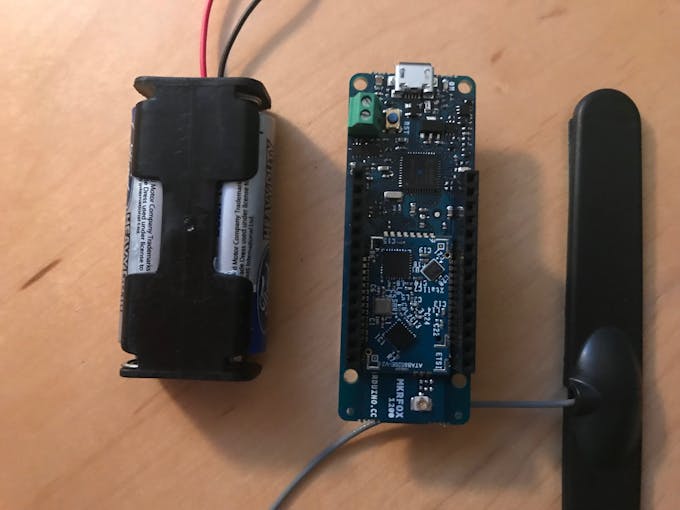 The first step is to get the Arduino MKR FOX, its antenna and a filled 2AA battery box ready