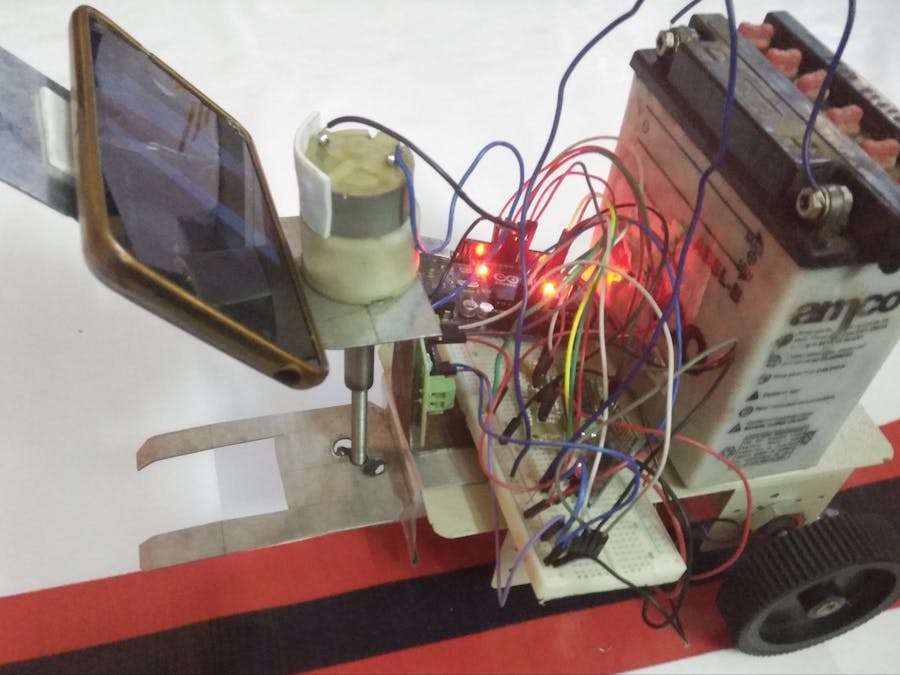 Vision-Based Self-Driving Pick and Place Robot