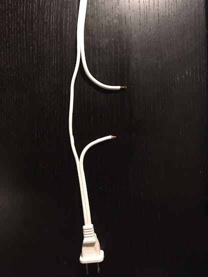 A split extension cable. The other wire is untouched.