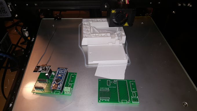 RF24 Network board V2 next to a prototype of its case (not finished yet)