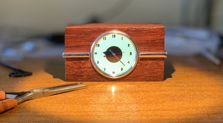 Chrome decorations, White Clock (with Rosewood Vinyl case treatment)