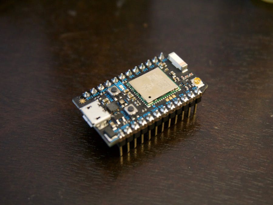 A Particle Photon Temperature Sensor to Monitor Wood Stoves