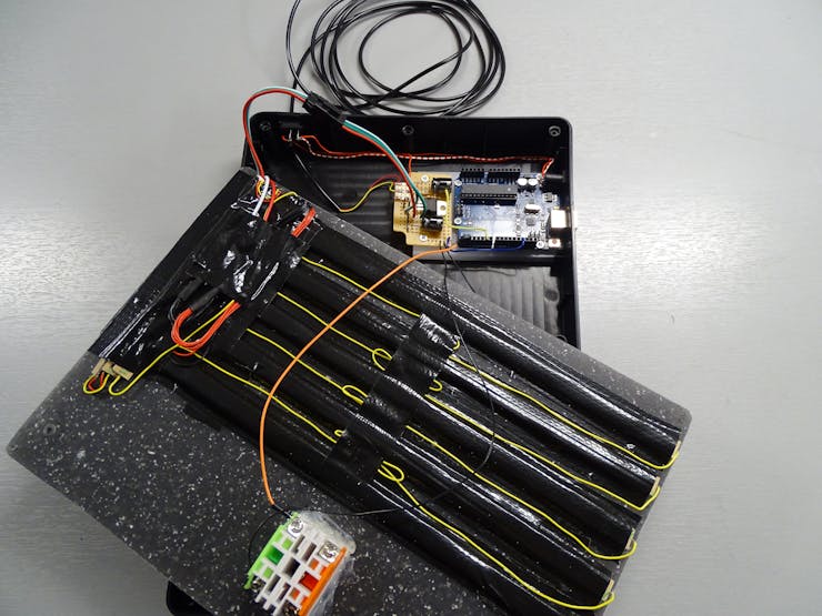 The complete assembly of the scoreboard (including the Arduino board and 5V regulator)