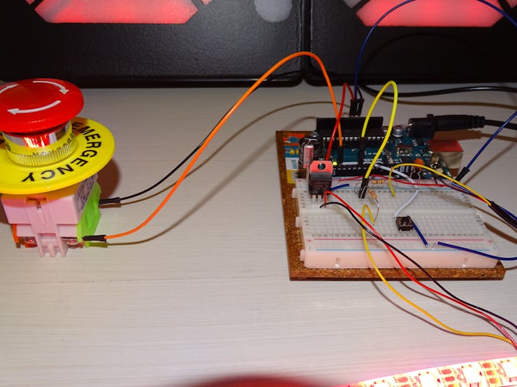 Breadboard set up with 7-segment displays and WS2812 Led trip connected in paralel 