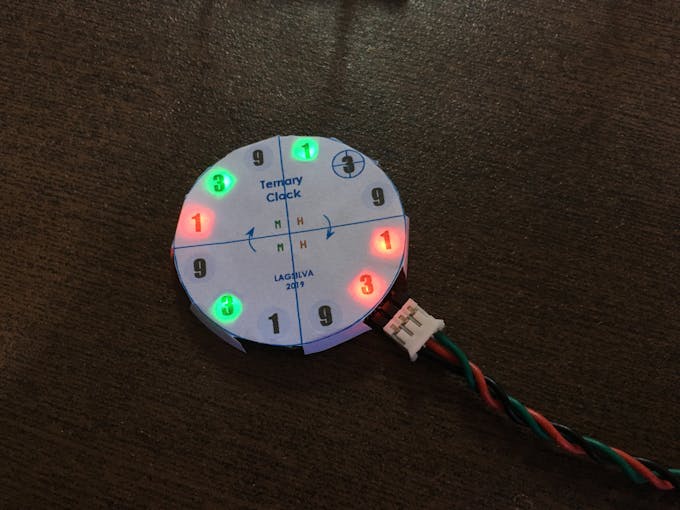 Paper Template covering Neopixel ring - Time shown: 18:35hs