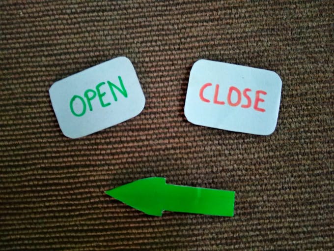 Labels and a cardboard arrow to indicate lock state