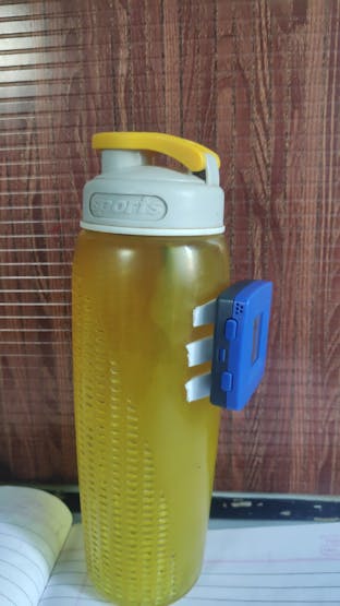 Attach the device to the bottle