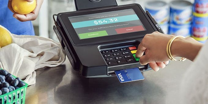 A picture of a payment terminal at a retail store.
