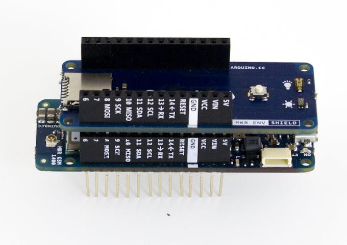 Carefully plug the MKR ENV Shield in the MKR GSM 1400 connector