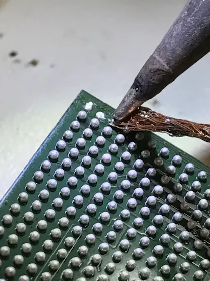 An example of removing solder balls with solder wick