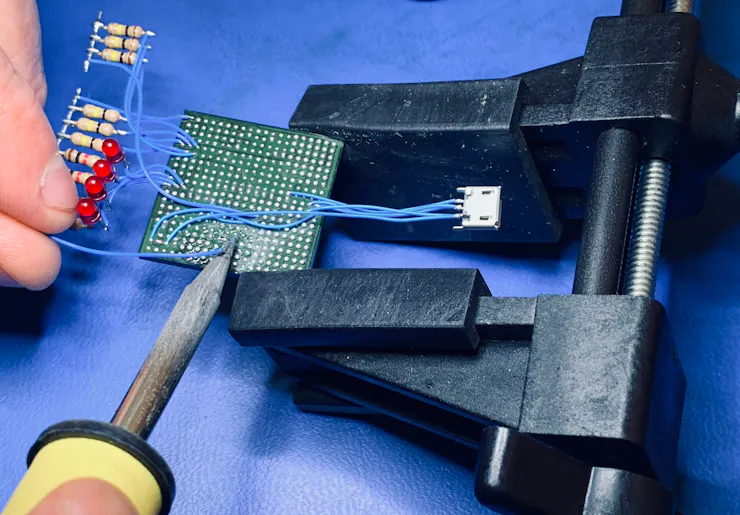 Soldering set up with a clamp to hold the project.