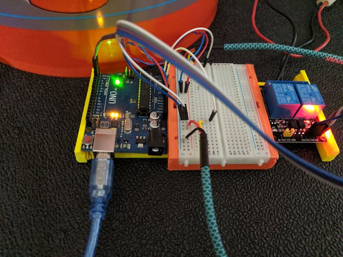 Arduino Uno connected to 2 proximity sensors and 2 relays
