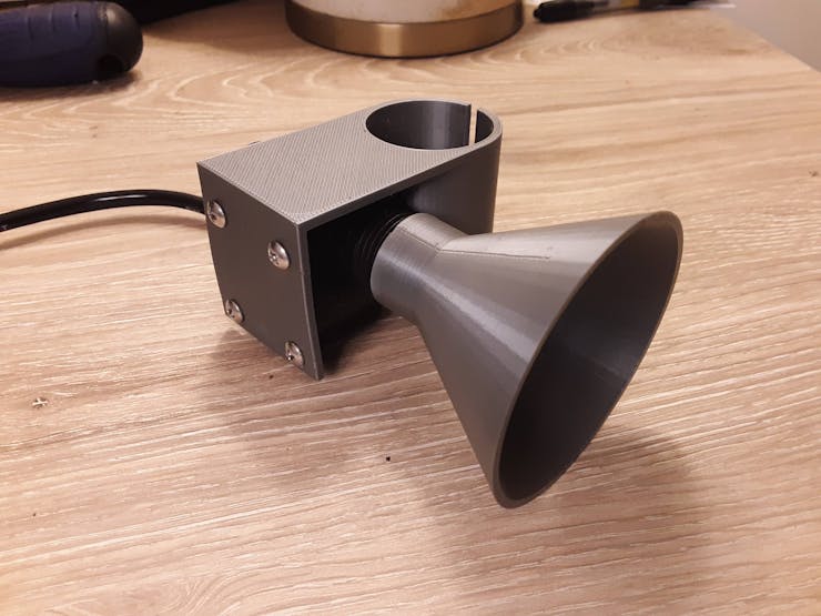 3D printed bracket and funnel attached to sensor