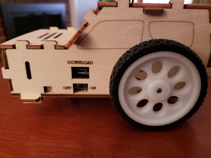 To charge, power switch to OFF position. Note the Download Micro USB port for program revisions.