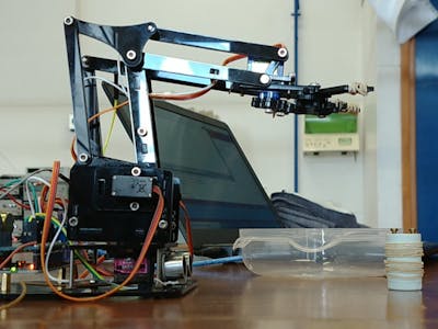 Robotic Arm-Objects Collector with Finite State Machines