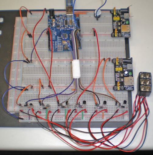 An overview of the breadboarded prototype - below right, the 2x6 array of solenoids for tactile representation of Braille dots.