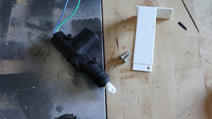 Actuator with bracket and screws