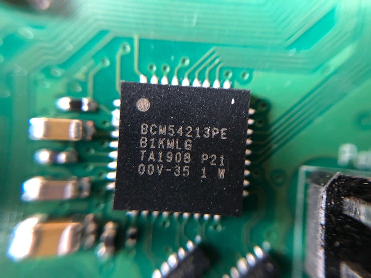 The Broadcom BCM54213PE gigabit Ethernet Transceiver. (📷: Alasdair Allan)