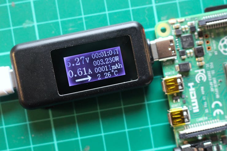The Raspberry Pi 4 idling with a USB-C test meter measuring the current. (📷: Alasdair Allan)