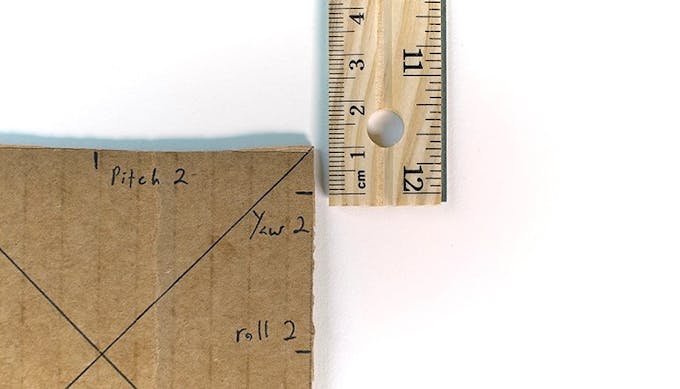 On the right side of the Base, measure 1cm from the top and mark Yaw 2.
