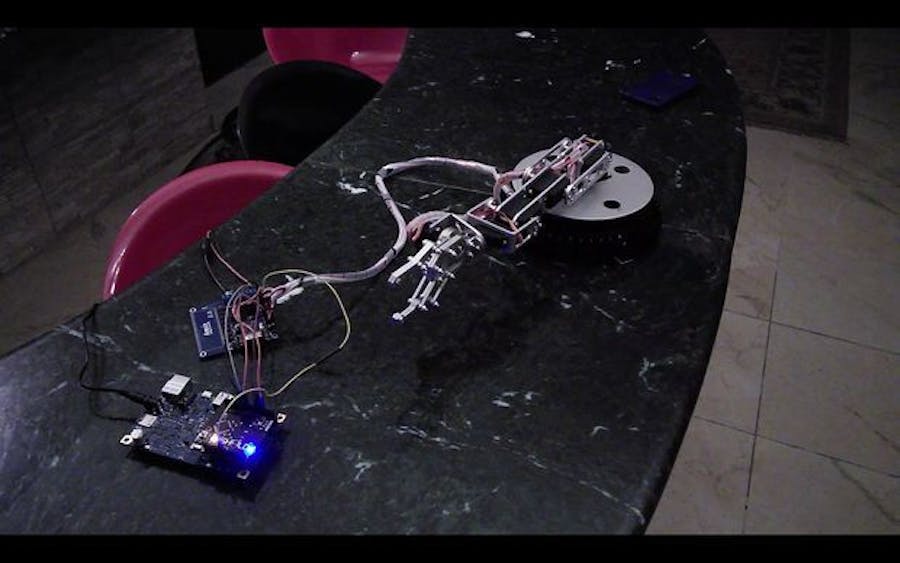 Control robotic arm with gloves and Android Phone