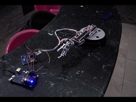 Control robotic arm with gloves and Android Phone
