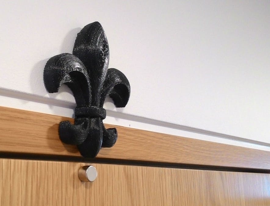 Fleur-de-lis door sensor