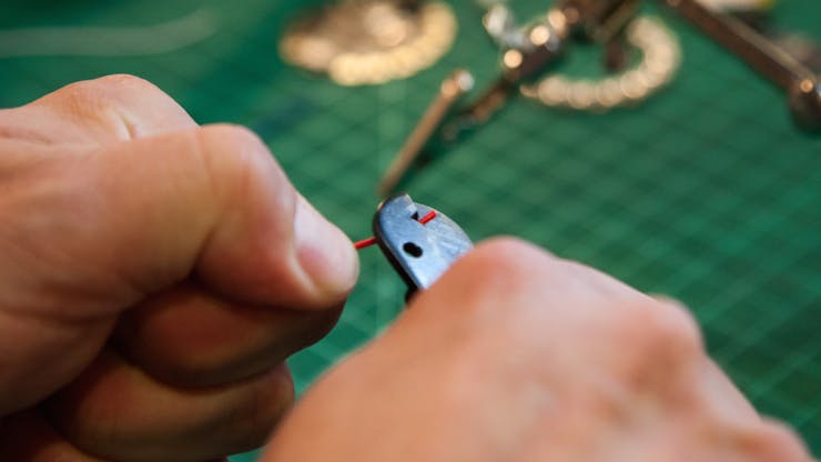 Cut four wires to a length of 3 inches and strip the ends.