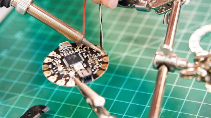 Repeat the process with another wire connected to the GND pad.