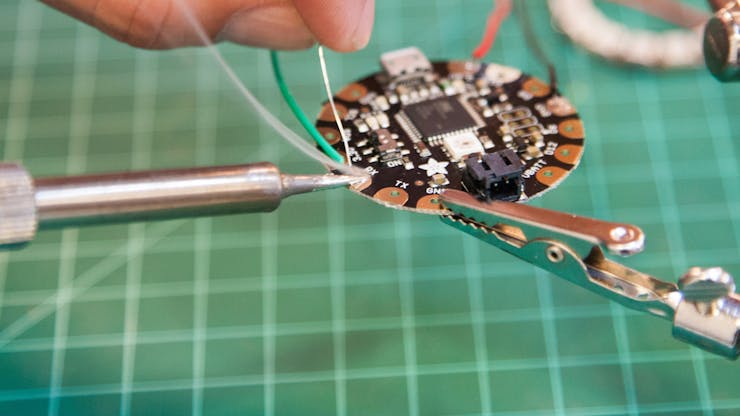 Connect another wire to the RX pad.