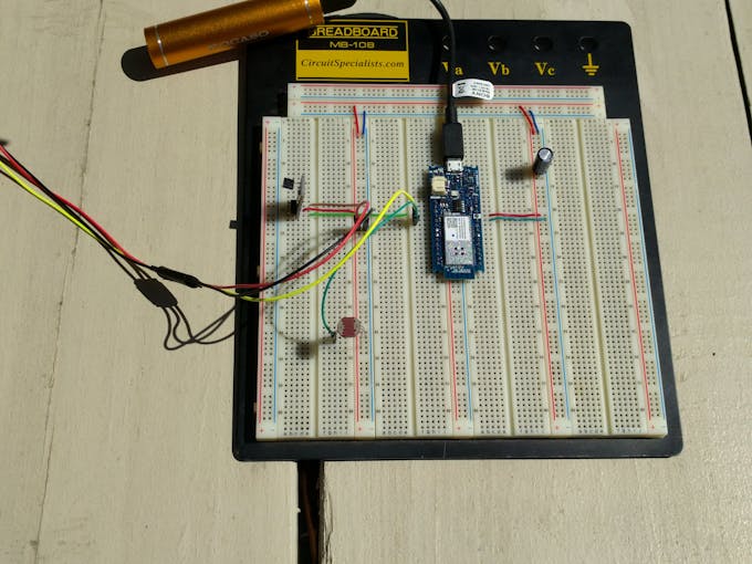 Circuit on breadboard, LM35 and photoresistor.