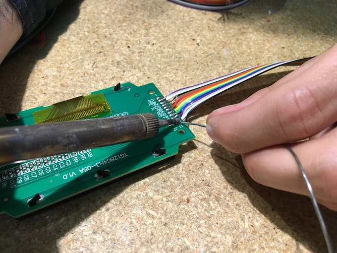 Soldering wires to the screen.