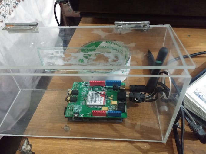 Fig 19: Arduino + GSM Shield inside the Transparent Plastic Box