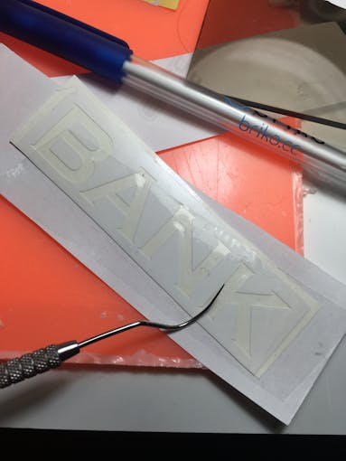 Use something sharp to clean your print.