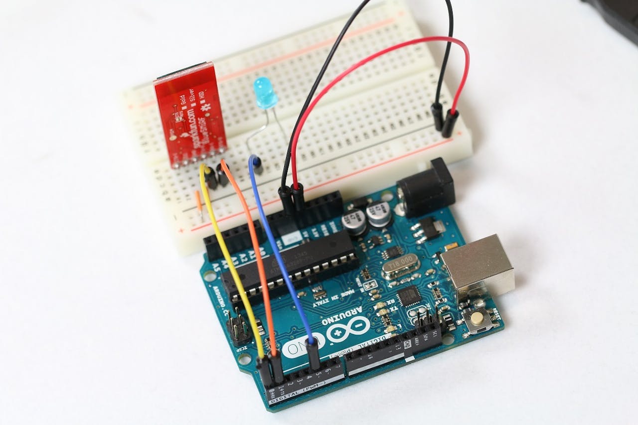 The anode of the LED is connected to the Arduino
